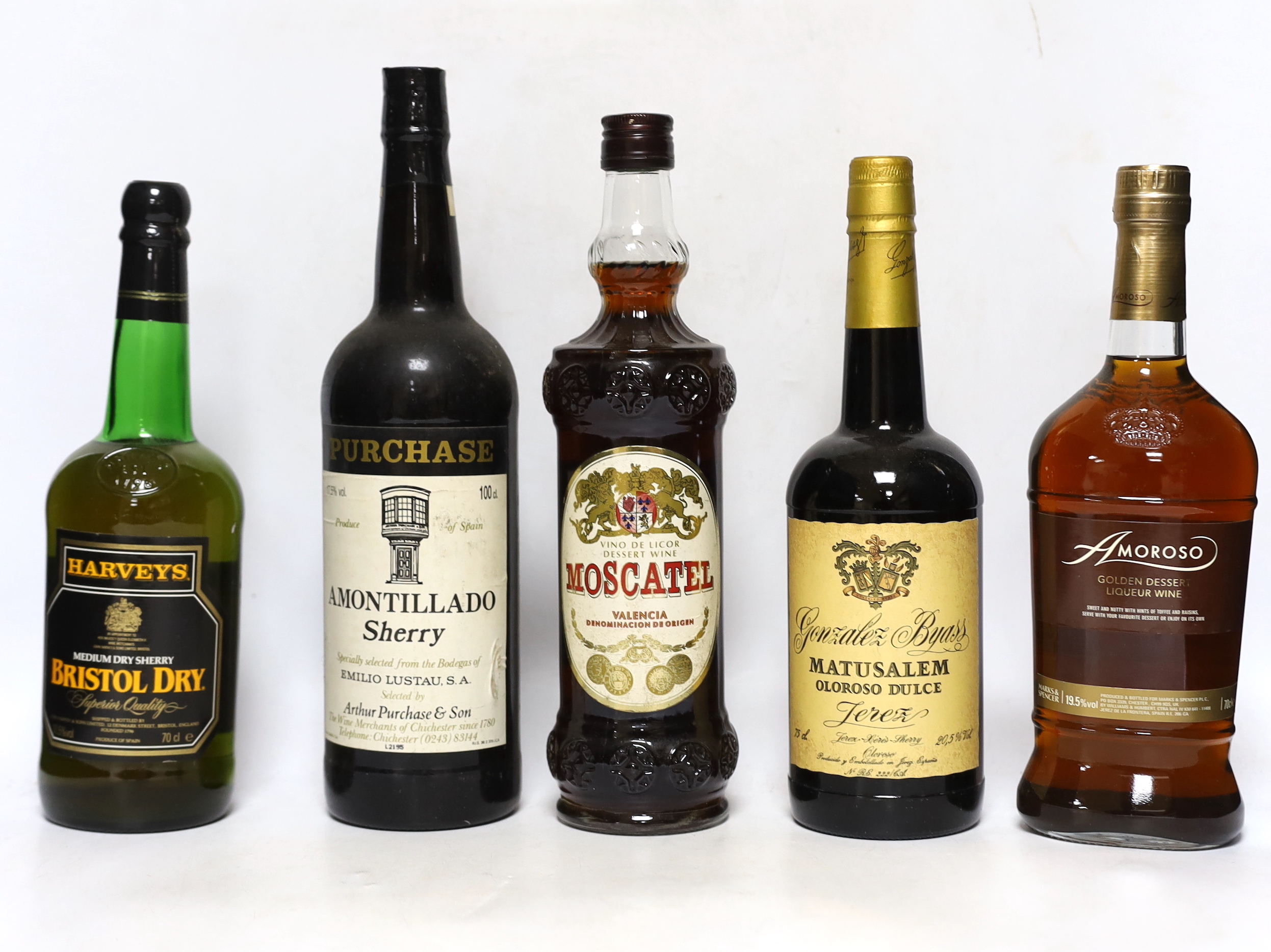 A selection of spirits, brandies and sherries to include Smirnoff, Jules Dumet, Cockspur etc